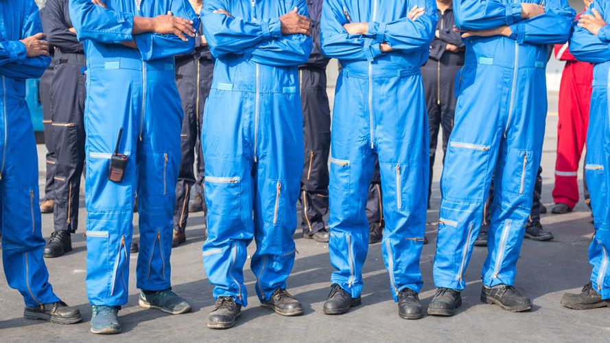 auto mechanics team wearing work uniform