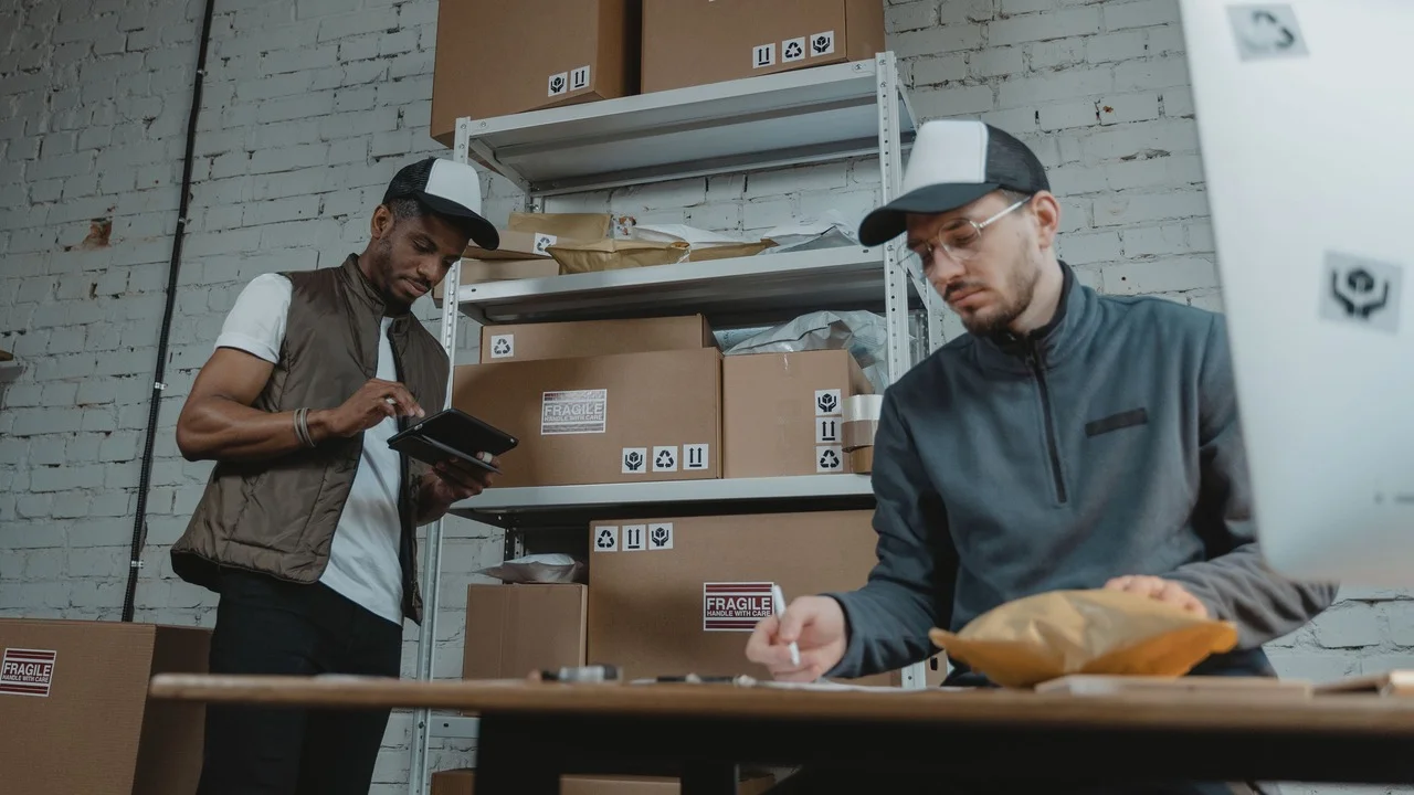 Employees working on the Uniform Ordering System Cost